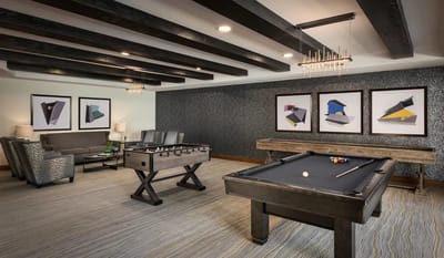 Common area with game tables and seating