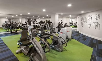 A modern fitness room with exercise equipment