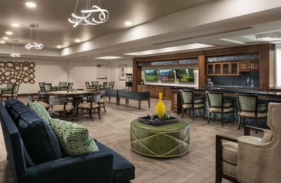 Bright common area with comfortable seating and decor