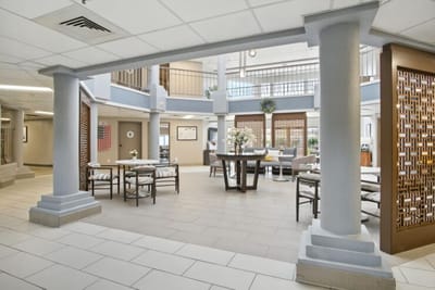 Interior common area with tables and seating.