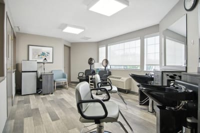 Hair salon interior with styling stations
