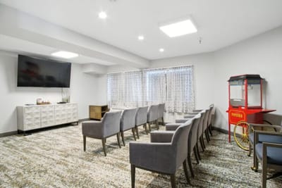 Common area with seating and a snack cart
