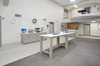 Lobby area with a coffee station and seating