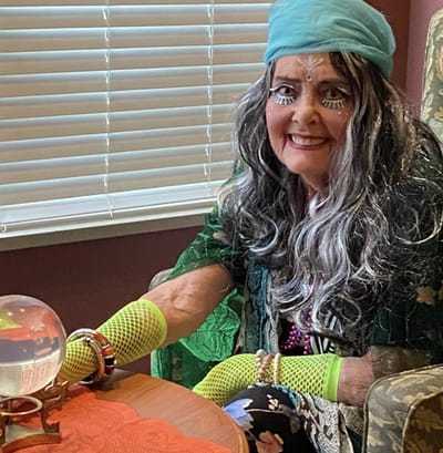 Resident engaged in an activity with a crystal ball.