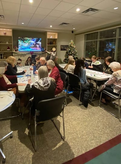 Residents engaged in a group activity during the holiday season.