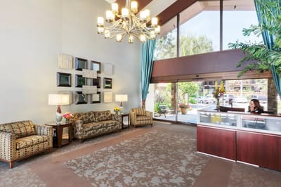 Reception area with seating and natural light