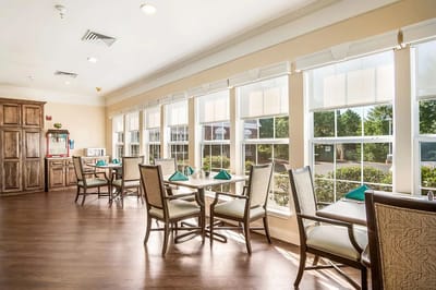 Bright dining room with large windows