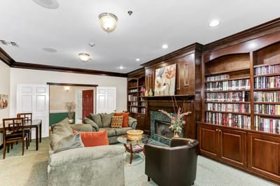 Cozy common area with bookshelves and seating
