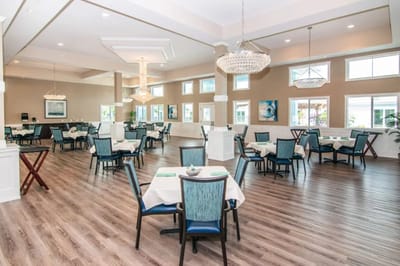 Elegant dining room with tables and chairs set up