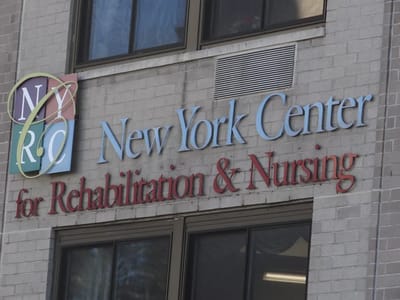 Facility logo on the building exterior