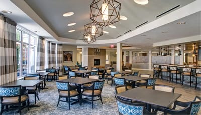 Interior view of a common area with tables and chairs