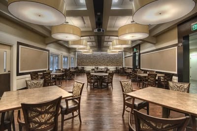 Dining area with tables and modern lighting
