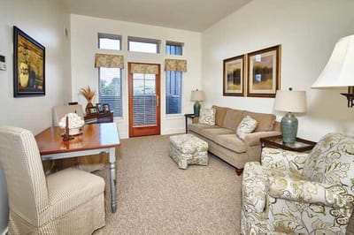 Bright living room area with furniture in a senior facility