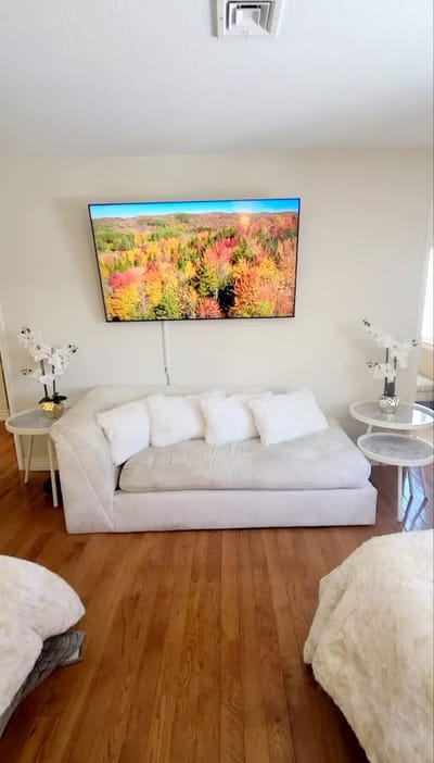 Cozy interior living space with autumn-themed artwork