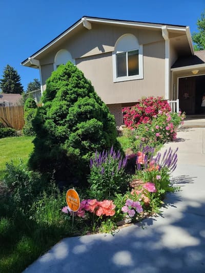 Entrance to assisted living facility with landscaped garden