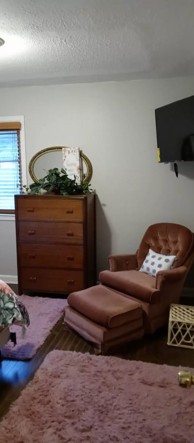 Cozy resident room with furniture and decor