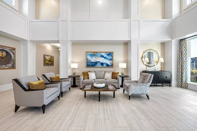 Bright lobby area with comfortable seating and artwork
