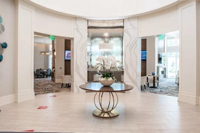 Interior view of a lobby with decorative plants