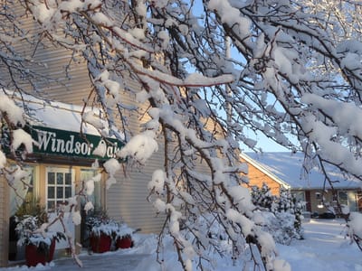 Exterior of Windsor Oaks with a snowy landscape