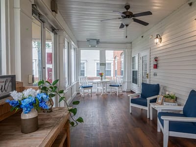 Bright and inviting sunroom with seating