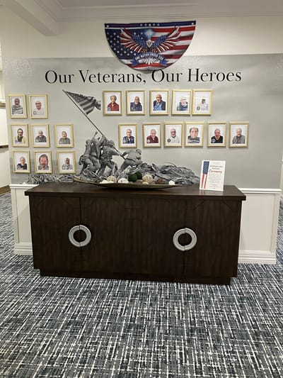 Interior display honoring veterans with framed photos