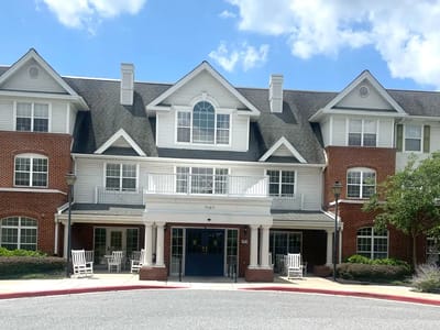 Exterior view of Charter Senior Living facility entrance