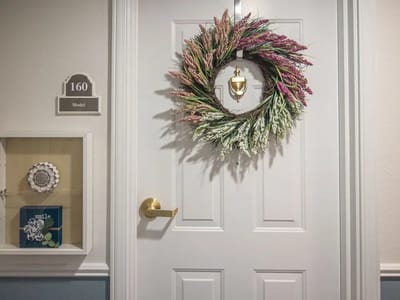 Decorative door wreath on a resident room door