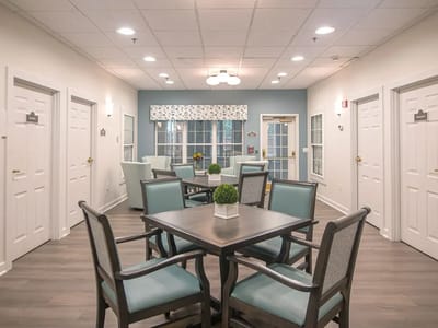 Bright common area with seating and natural light