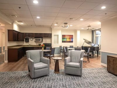 Interior common area with seating and dining tables