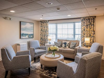 Bright common area with seating and decor