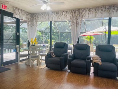 Indoor common area with comfortable seating and views of the outdoors