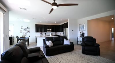 Bright and modern living room with kitchen view