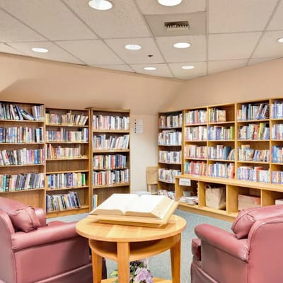 Library corner with shelves and seating