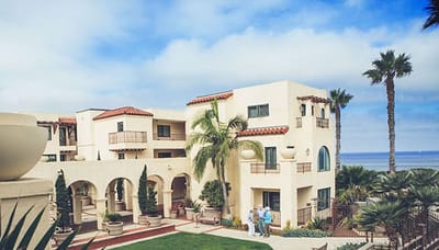 Exterior view of a senior living facility by the sea