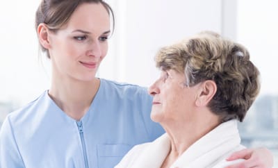 Caregiver interacting with an elderly resident