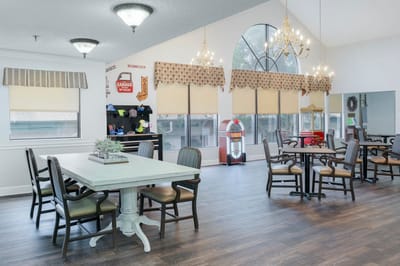 Bright common area with tables and seating