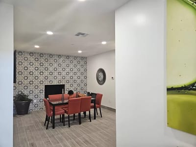 Interior common area with dining table and chairs