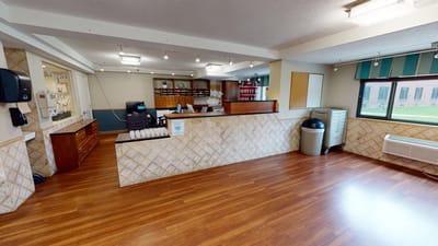 Bright reception area with wooden flooring