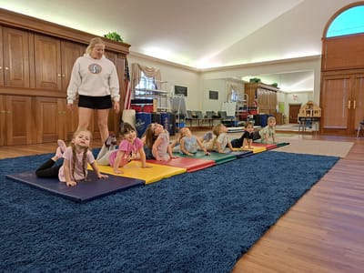 Children engaged in a fun indoor activity.
