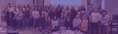 Staff members gathered for a leadership event.