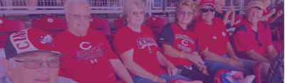 Seniors enjoying a baseball game together.