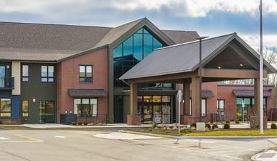 Exterior view of a modern assisted living facility.
