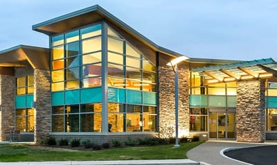 Exterior view of a modern assisted living facility.