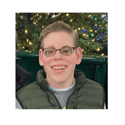 Smiling young man in a festive setting