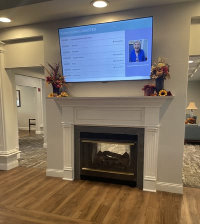 Common area with schedule display and decorations