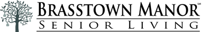 Brasstown Manor Senior Living, assisted living in Hiawassee, GA — Logo of Brasstown Manor Senior Living in green and black