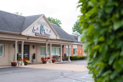 CedarWoods Assisted Living exterior with welcoming entrance