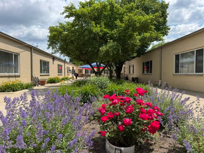 Beautiful outdoor space with gardens and residents
