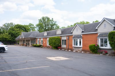 Exterior view of CedarWoods Assisted Living building