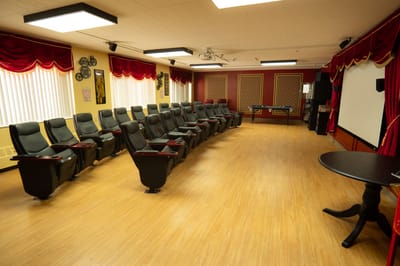 Interior of a film viewing room with seating